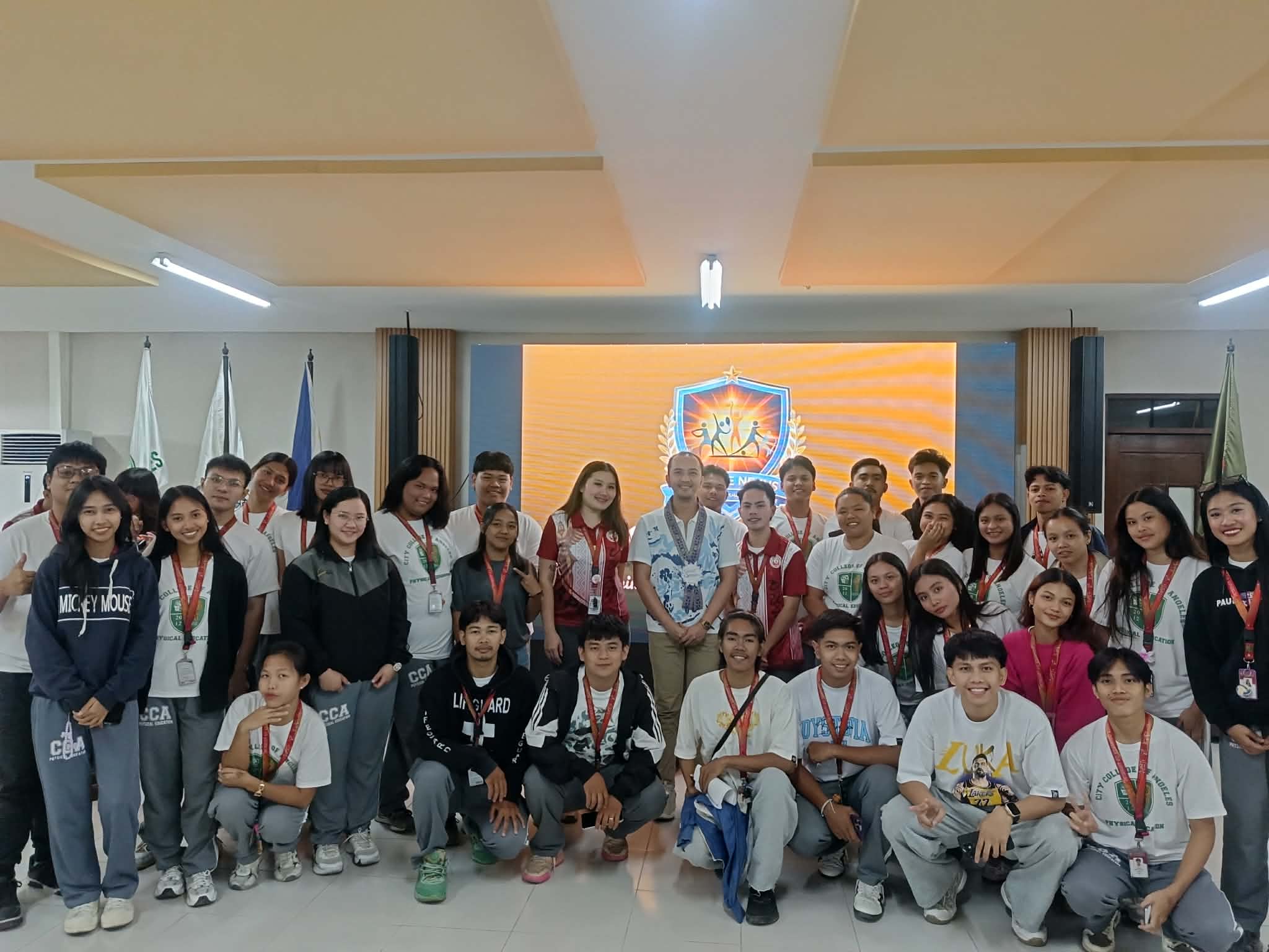 Grand group photo in auditorium